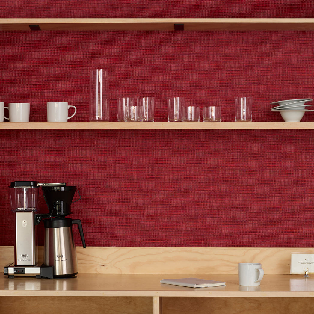 Chilewich Basketweave floor mat in Scarlet, showcasing woven terrastrand yarn texture and modern design aesthetic.