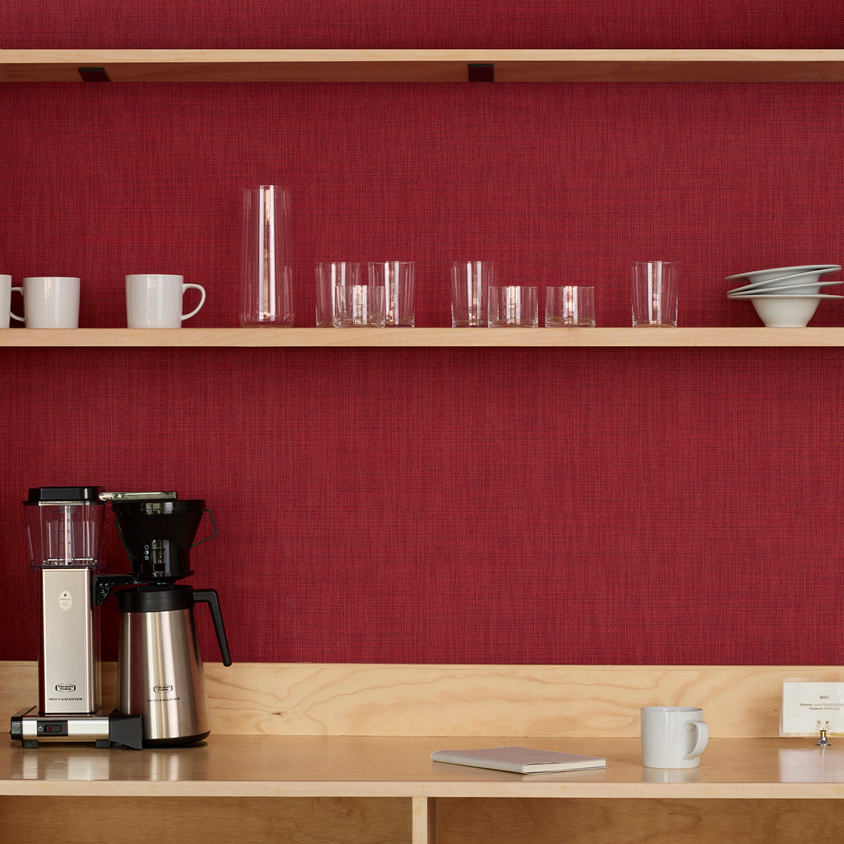 Chilewich Basketweave floor mat in Scarlet, showcasing woven terrastrand yarn texture and modern design aesthetic.