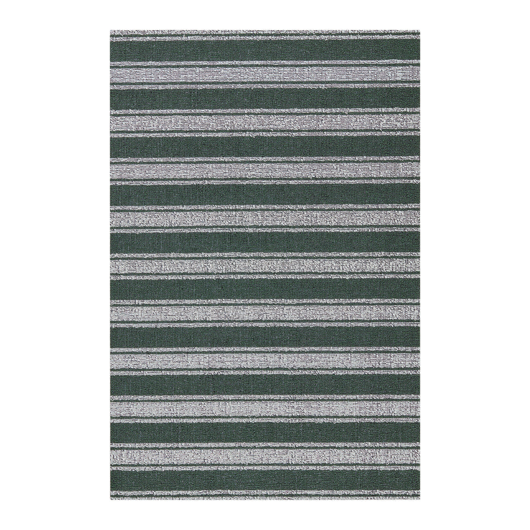 Chilewich striped woven mat with textured terrastrand yarn surface, featuring modern linear design and durable finish.