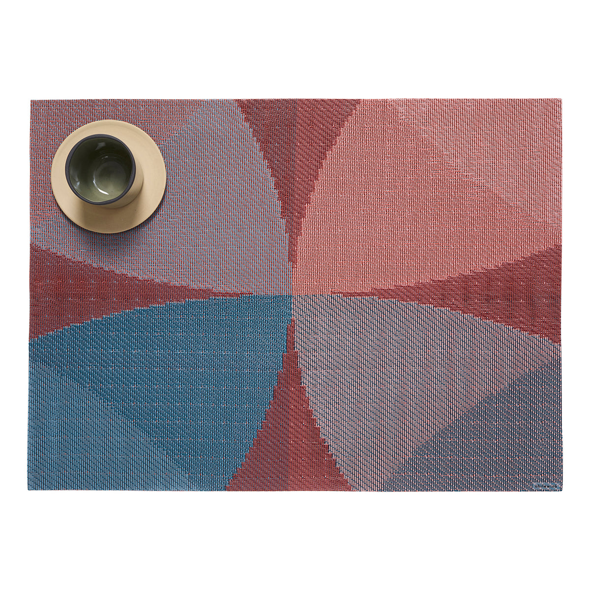 Chilewich woven placemat with subtle texture and contemporary design, ideal for dining and tabletop decor.