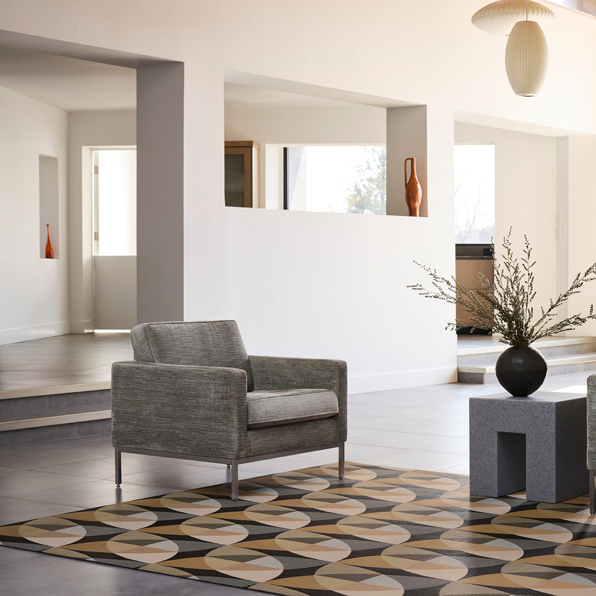 Chilewich woven floor mat in neutral woven terrastrand yarn, durable and stylish for modern living spaces.