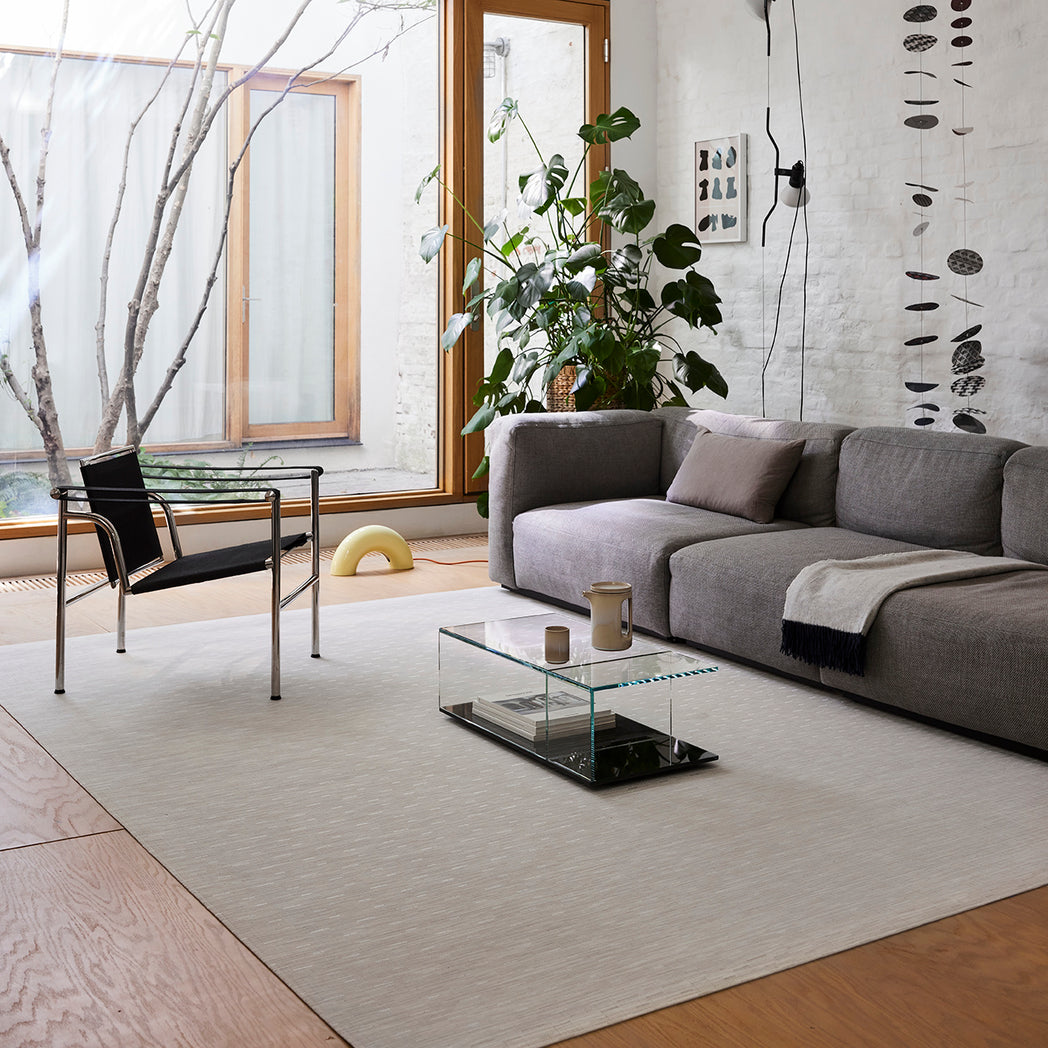 Chilewich woven floor mat in neutral woven terrastrand yarn, durable and stylish for modern living spaces.