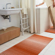 Chilewich woven floor mat in neutral woven terrastrand yarn, durable and stylish for modern living spaces.