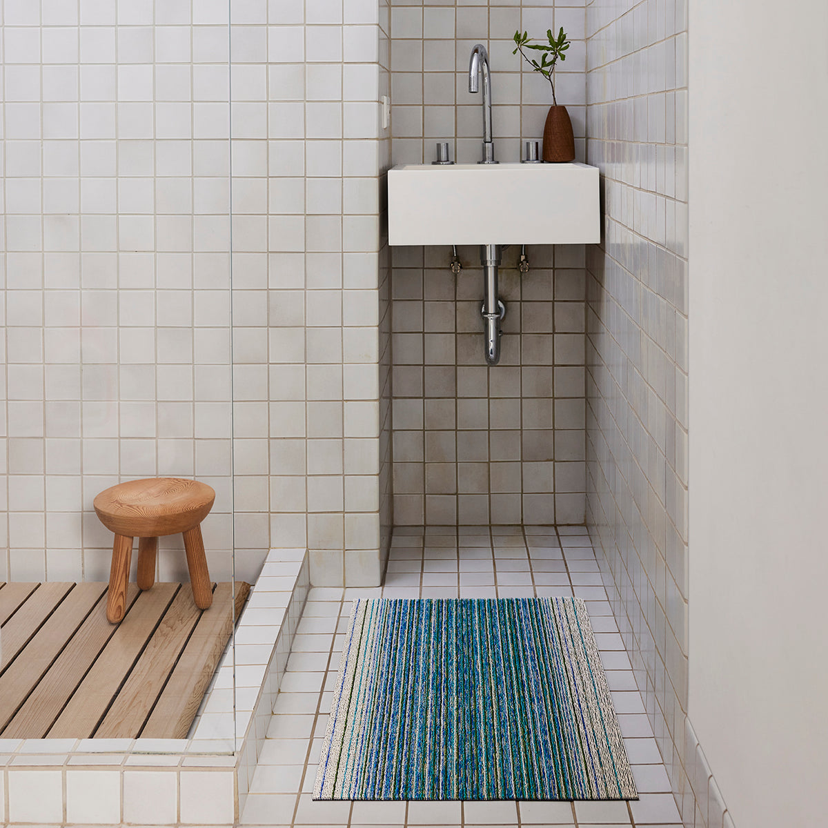 Chilewich woven floor mat in neutral woven terrastrand yarn, durable and stylish for modern living spaces.