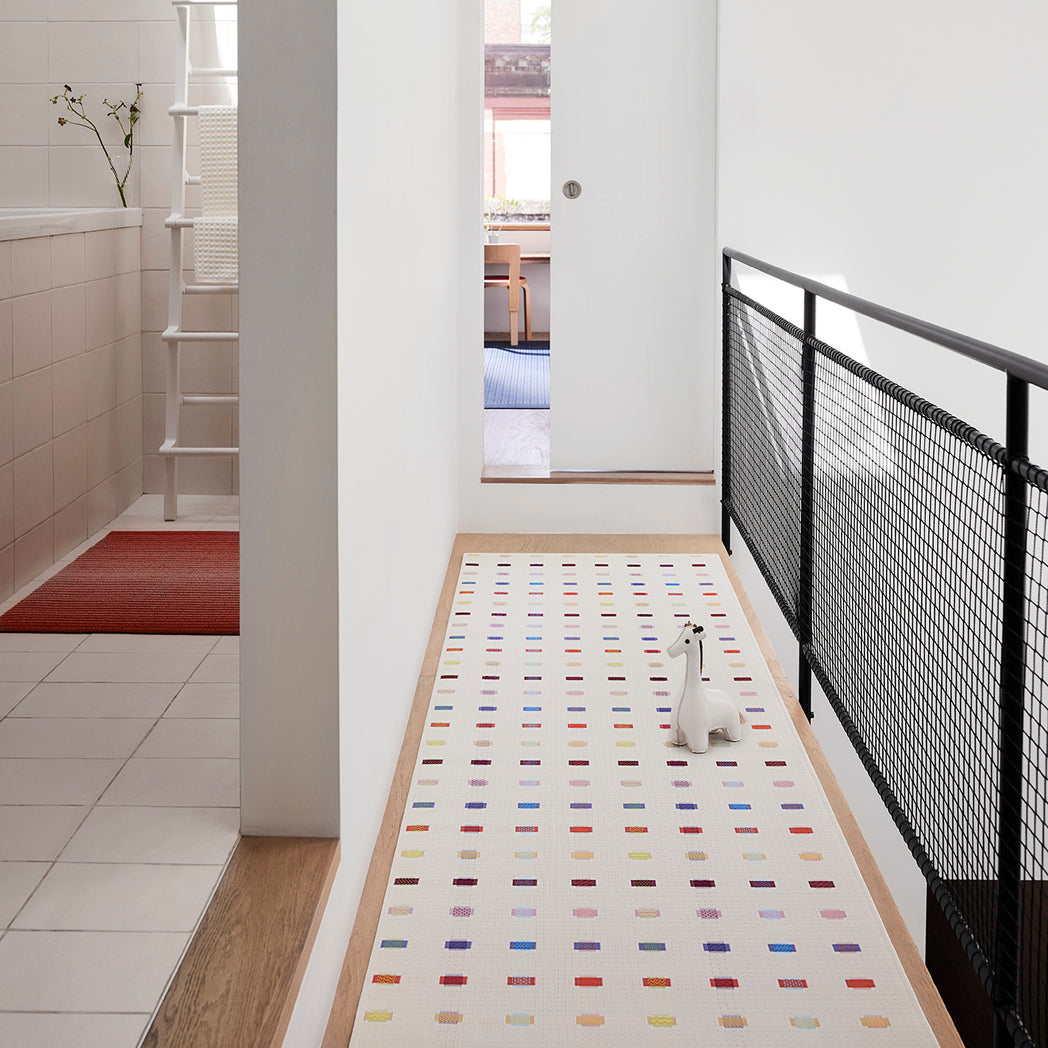 Chilewich woven floor mat in neutral woven terrastrand yarn, durable and stylish for modern living spaces.
