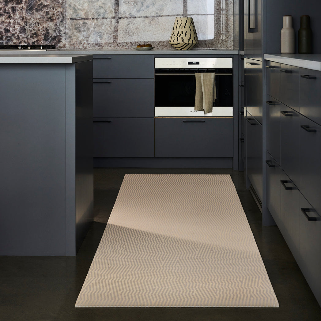 Chilewich woven floor mat in neutral woven terrastrand yarn, durable and stylish for modern living spaces.