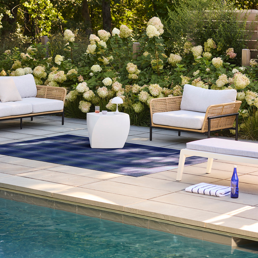 Chilewich woven floor mat in neutral woven terrastrand yarn, durable and stylish for modern living spaces.