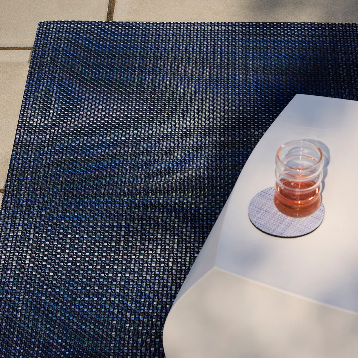 Chilewich woven floor mat in neutral woven terrastrand yarn, durable and stylish for modern living spaces.