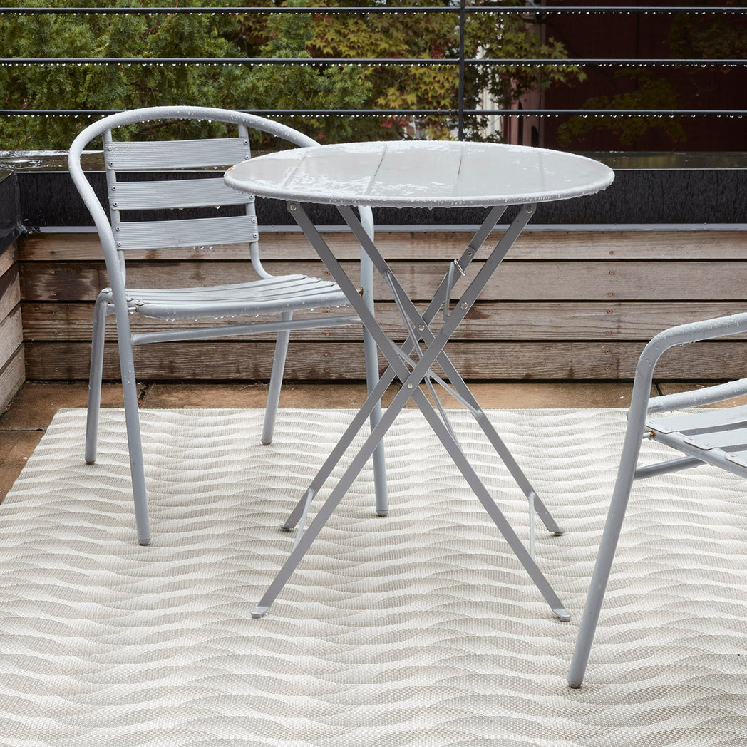 Chilewich woven floor mat in neutral woven terrastrand yarn, durable and stylish for modern living spaces.