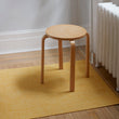 Chilewich Basketweave floor mat in Ochre, showcasing woven terrastrand yarn texture and modern design aesthetic.