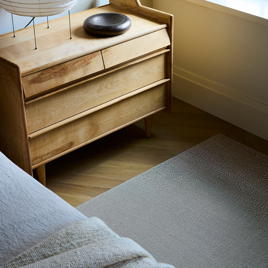 Chilewich woven floor mat in neutral woven terrastrand yarn, durable and stylish for modern living spaces.