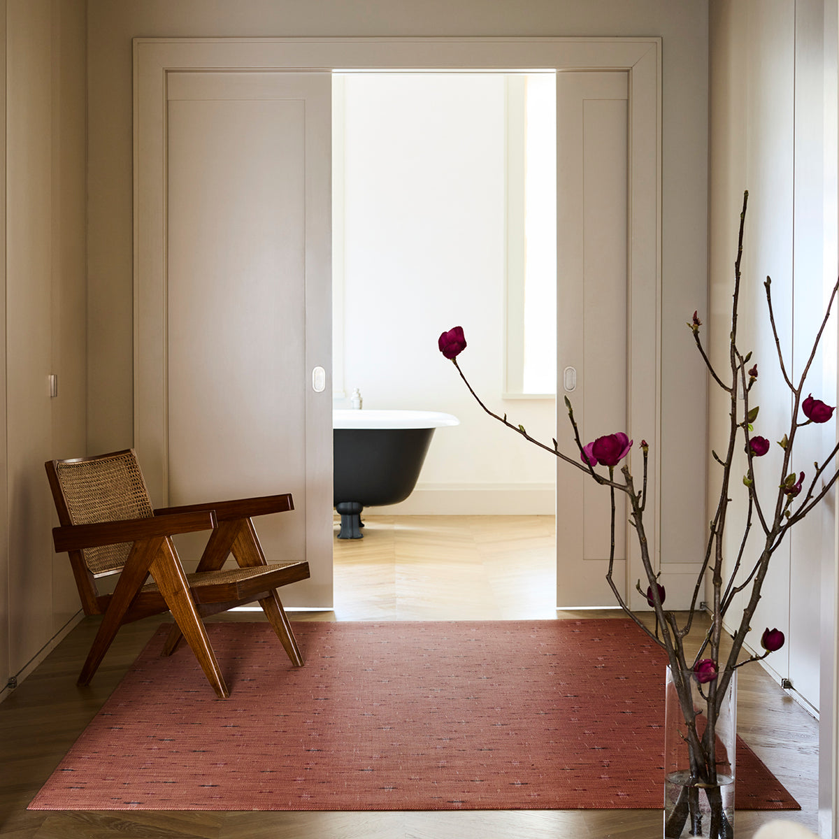 Chilewich woven floor mat in neutral woven terrastrand yarn, durable and stylish for modern living spaces.