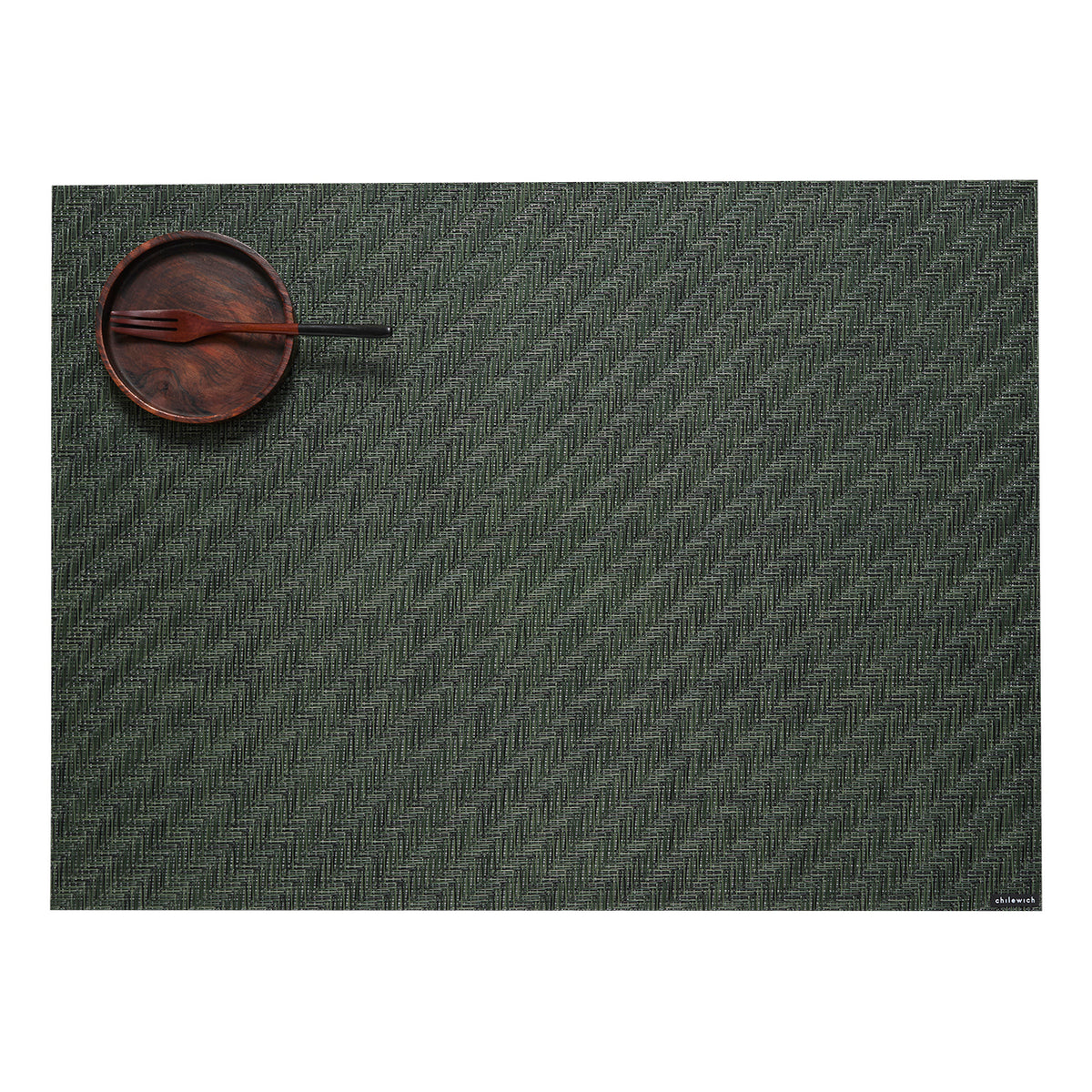 Chilewich woven placemat with subtle texture and contemporary design, ideal for dining and tabletop decor.