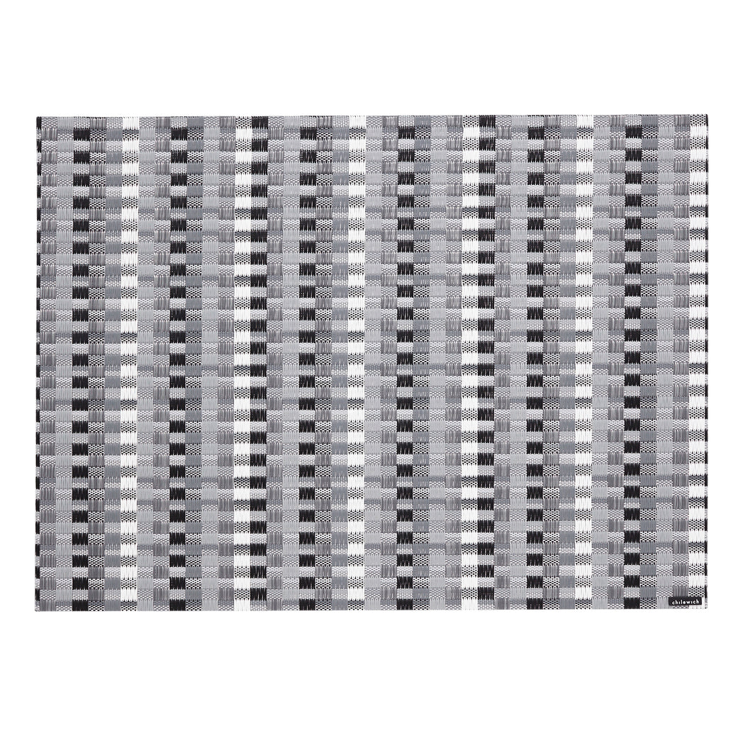 Chilewich woven placemat with subtle texture and contemporary design, ideal for dining and tabletop decor.