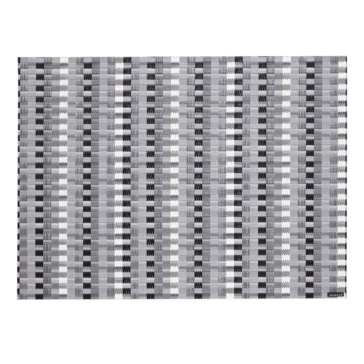 Chilewich woven placemat with subtle texture and contemporary design, ideal for dining and tabletop decor.