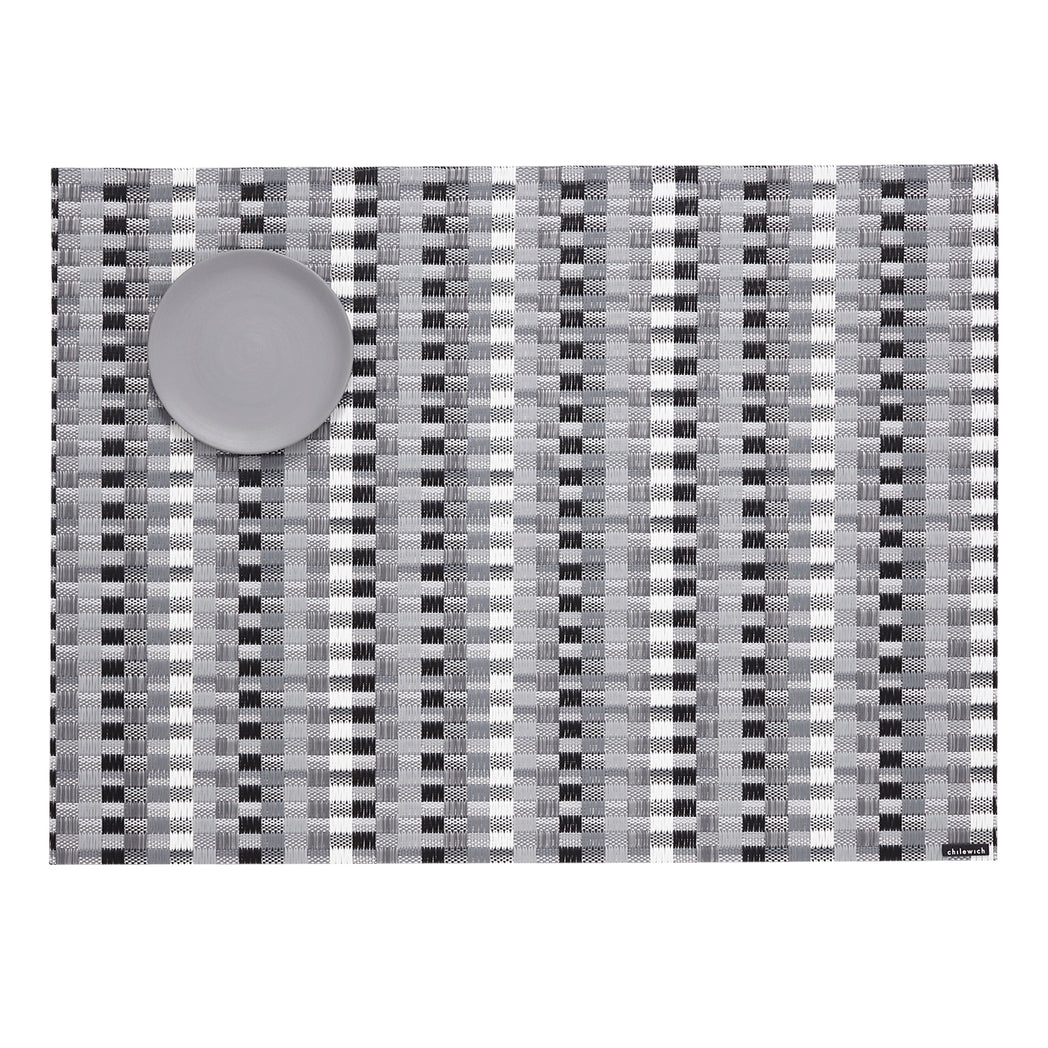 Chilewich woven placemat with subtle texture and contemporary design, ideal for dining and tabletop decor.