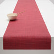 Chilewich Basketweave floor mat in Scarlet, showcasing woven terrastrand yarn texture and modern design aesthetic.