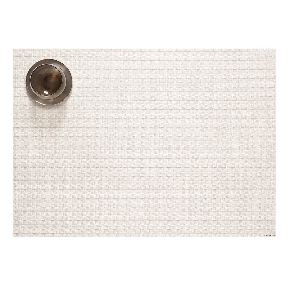 Chilewich woven placemat with subtle texture and contemporary design, ideal for dining and tabletop decor.