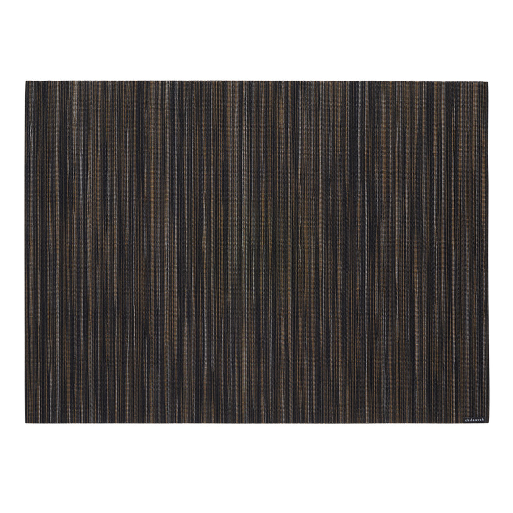 Chilewich woven placemat with subtle texture and contemporary design, ideal for dining and tabletop decor.