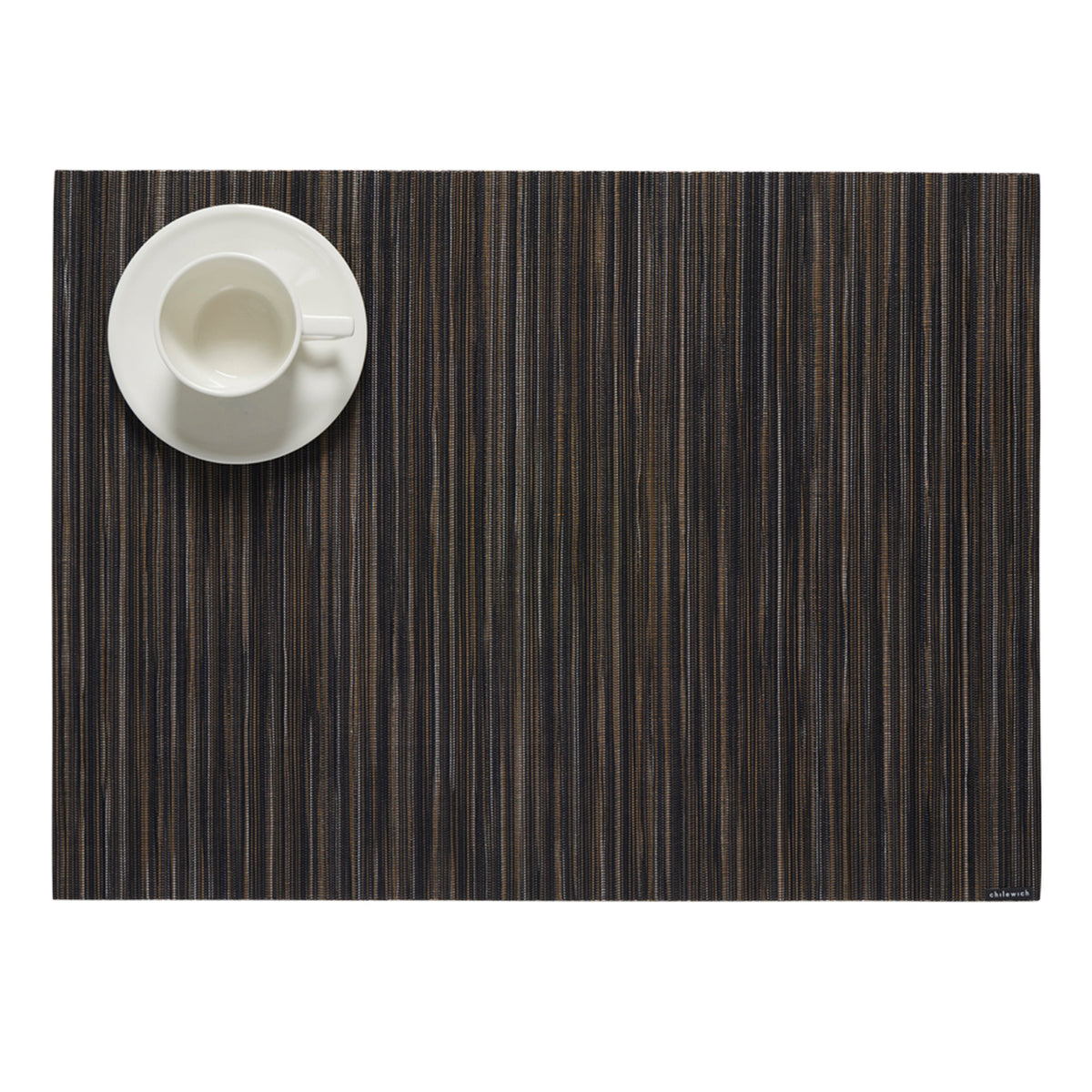 Chilewich woven placemat with subtle texture and contemporary design, ideal for dining and tabletop decor.