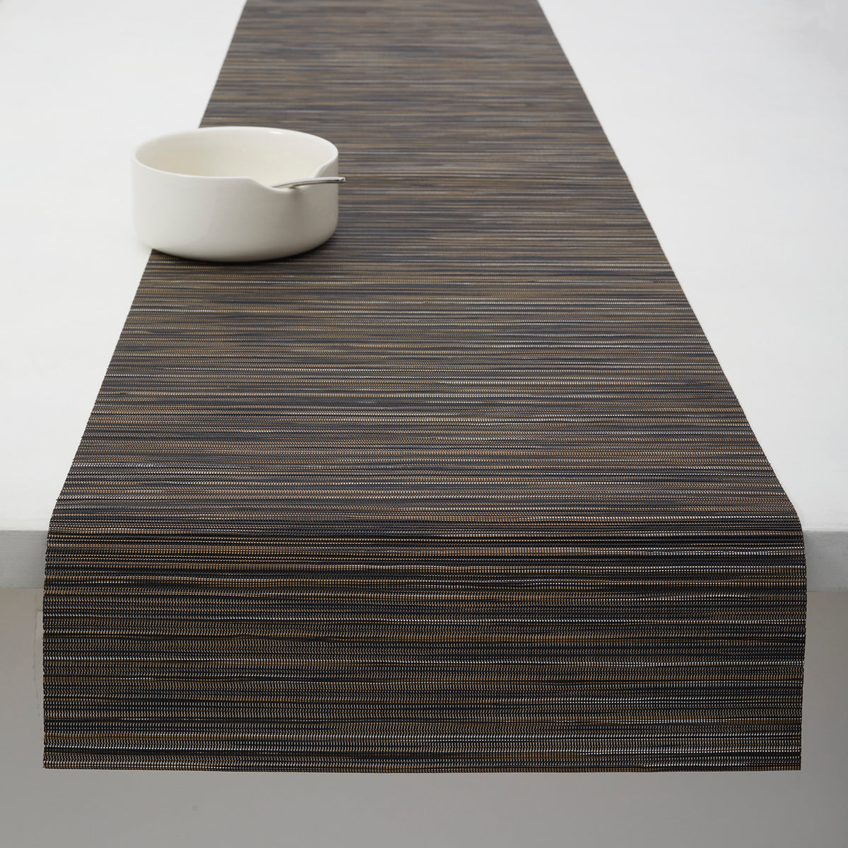 Detail image of Chilewich woven material showcasing texture, color, and pattern of the terrastrand yarn weave.
