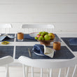 Chilewich Basketweave floor mat in Denim, showcasing woven terrastrand yarn texture and modern design aesthetic.