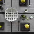 Chilewich Basketweave floor mat in Shadow, showcasing woven terrastrand yarn texture and modern design aesthetic.
