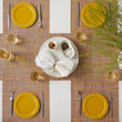 Chilewich Basketweave floor mat in Confetti, showcasing woven terrastrand yarn texture and modern design aesthetic.