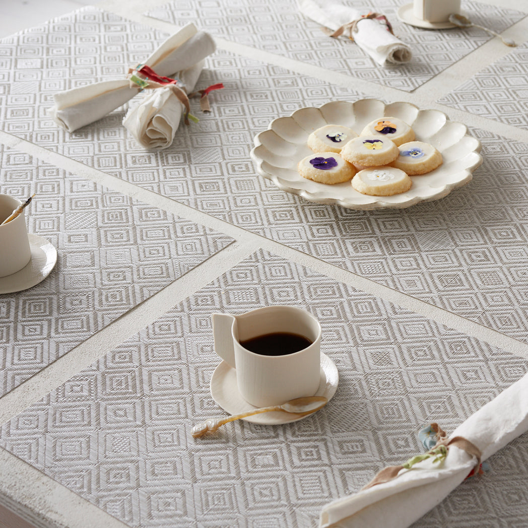 Detail image of Chilewich woven material showcasing texture, color, and pattern of the terrastrand yarn weave.