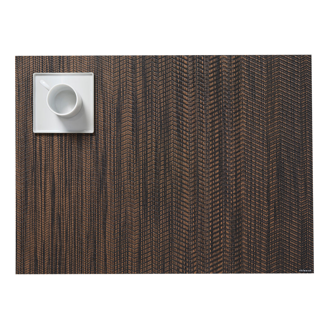 Chilewich woven placemat with subtle texture and contemporary design, ideal for dining and tabletop decor.