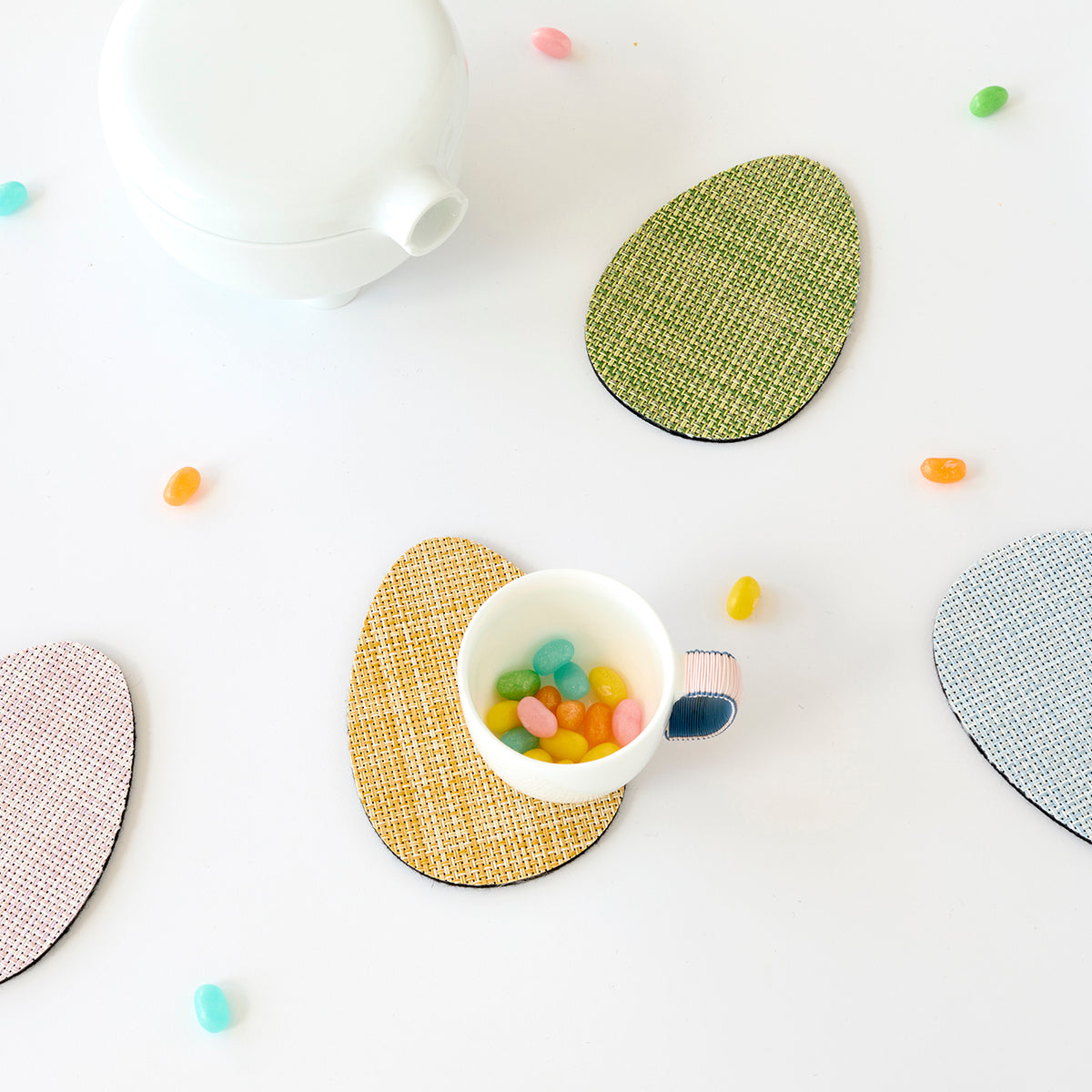 Chilewich Basketweave floor mat in egg, showcasing woven terrastrand yarn texture and modern design aesthetic.