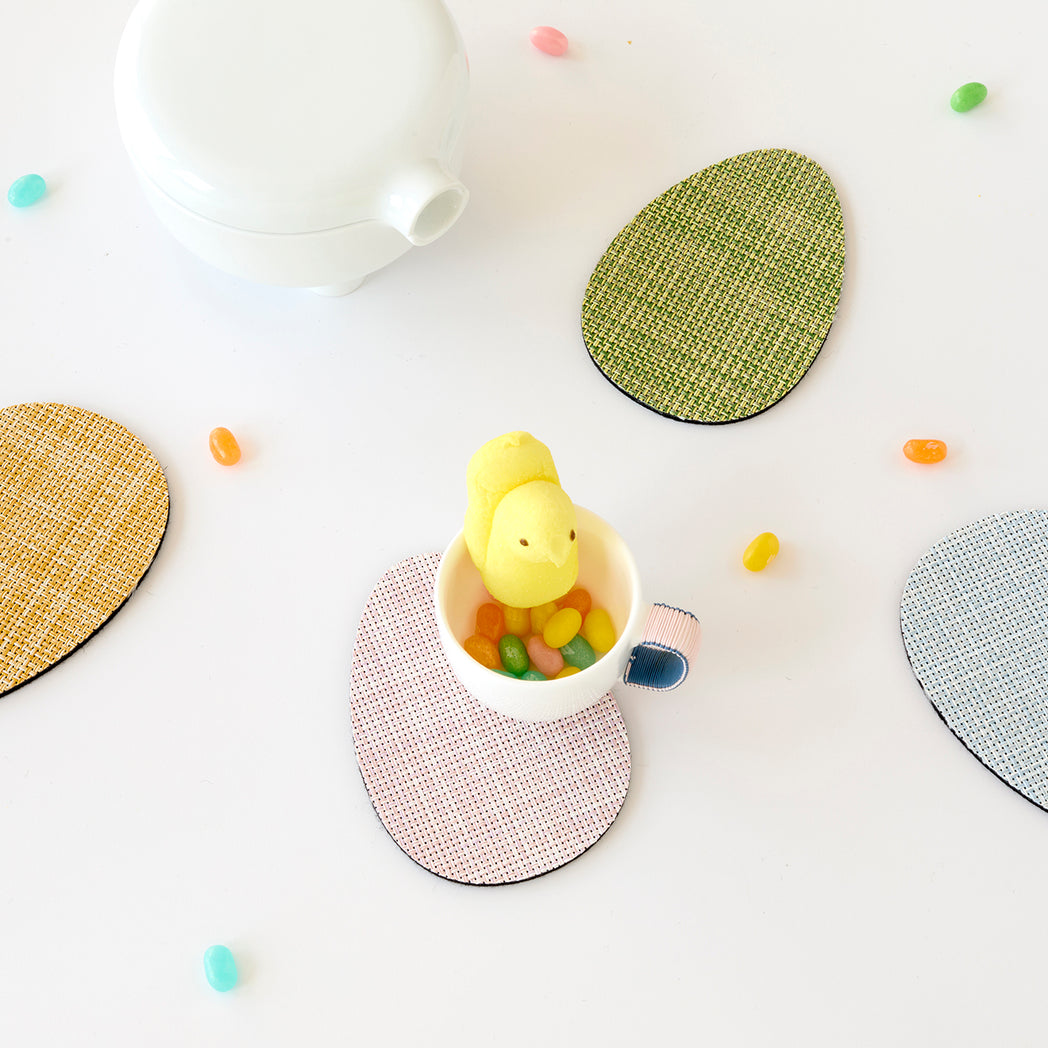 Chilewich Basketweave floor mat in egg, showcasing woven terrastrand yarn texture and modern design aesthetic.