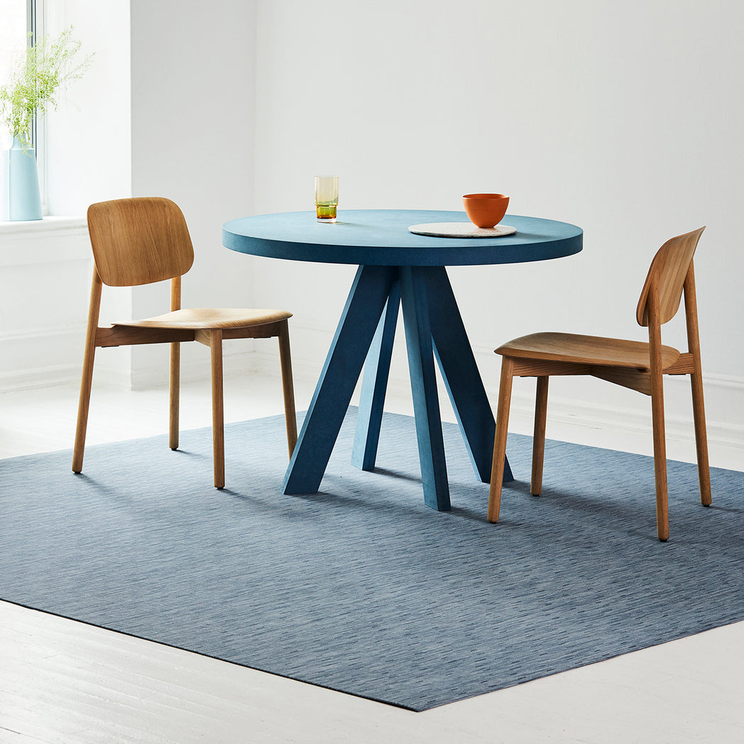 Chilewich woven floor mat in neutral woven terrastrand yarn, durable and stylish for modern living spaces.