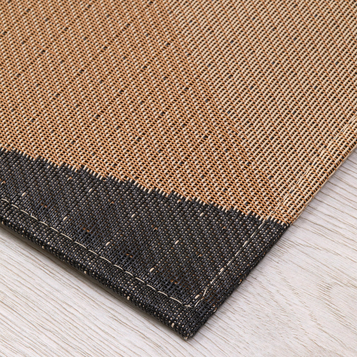 Chilewich woven floor mat in neutral woven terrastrand yarn, durable and stylish for modern living spaces.