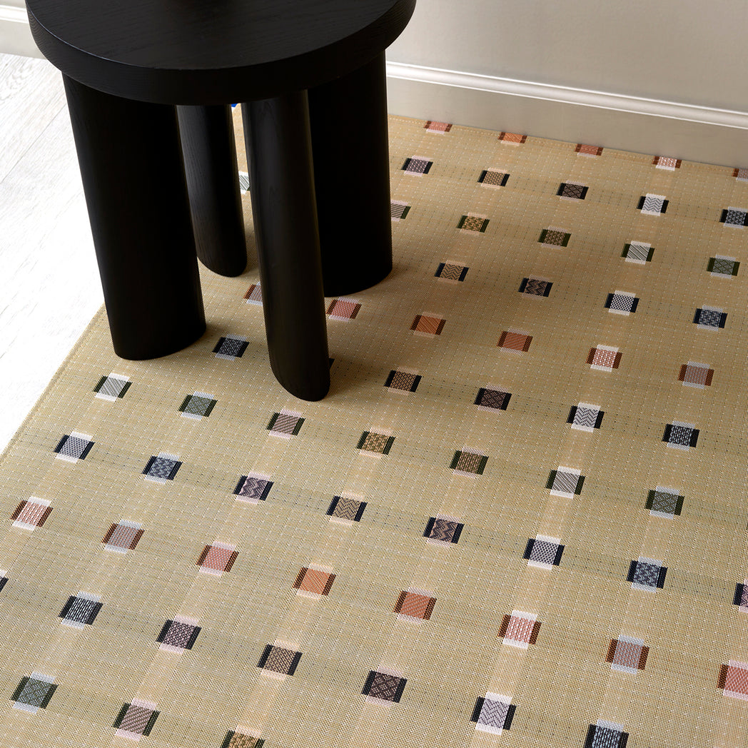 Chilewich woven floor mat in neutral woven terrastrand yarn, durable and stylish for modern living spaces.