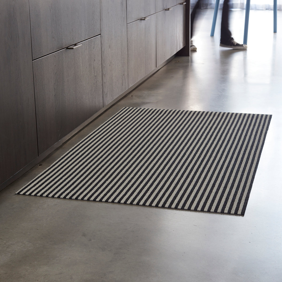 Chilewich woven floor mat in neutral woven terrastrand yarn, durable and stylish for modern living spaces.