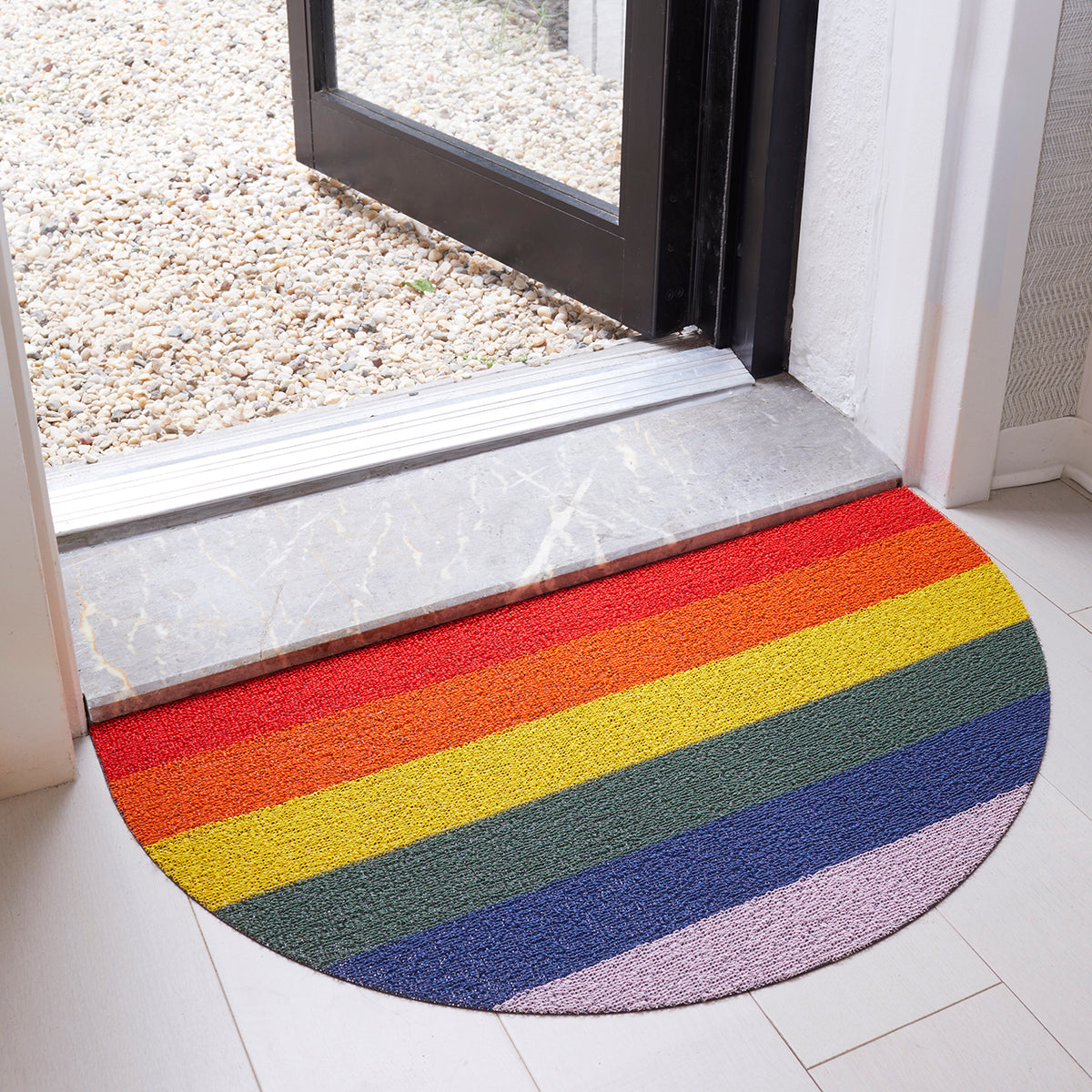 Chilewich woven floor mat in neutral woven terrastrand yarn, durable and stylish for modern living spaces.
