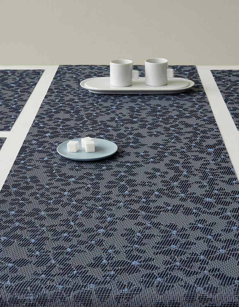 Detail image of Chilewich woven material showcasing texture, color, and pattern of the terrastrand yarn weave.