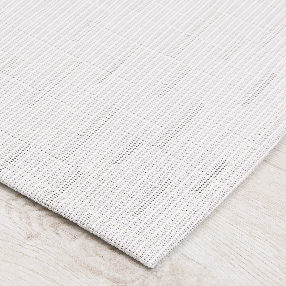 Detail image of Chilewich woven material showcasing texture, color, and pattern of the terrastrand yarn weave.