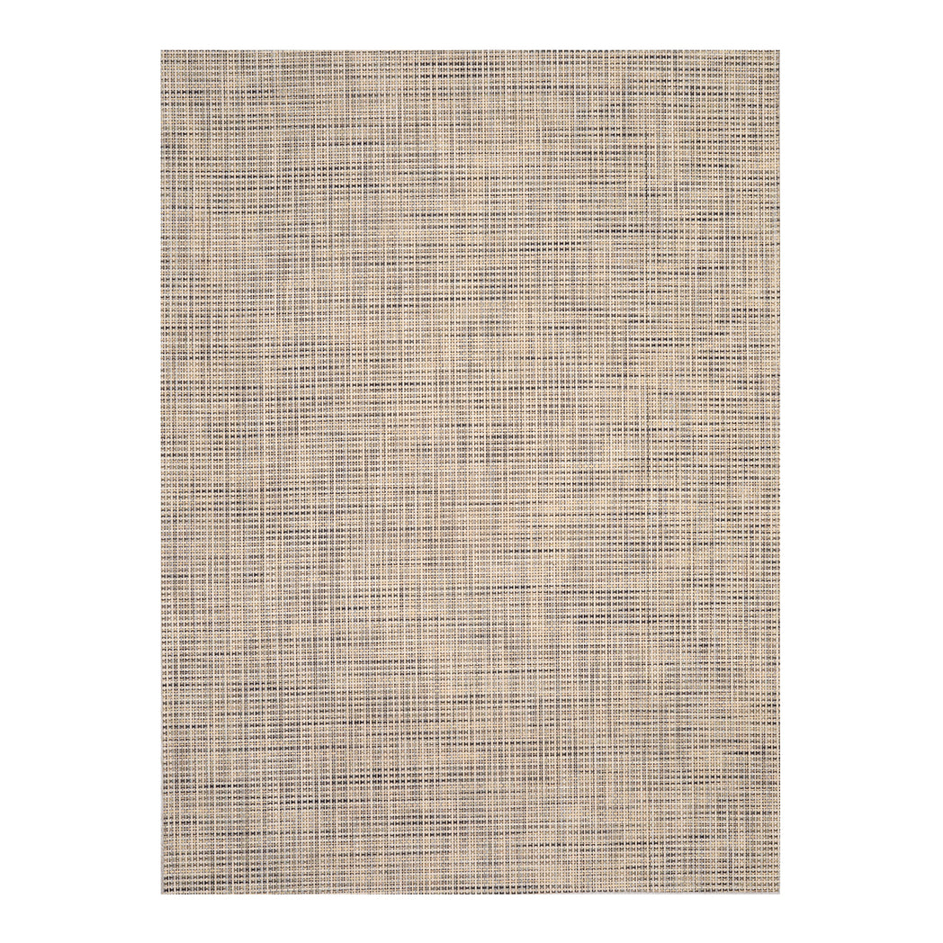Chilewich Basketweave floor mat in buckwheat, showcasing woven terrastrand yarn texture and modern design aesthetic.