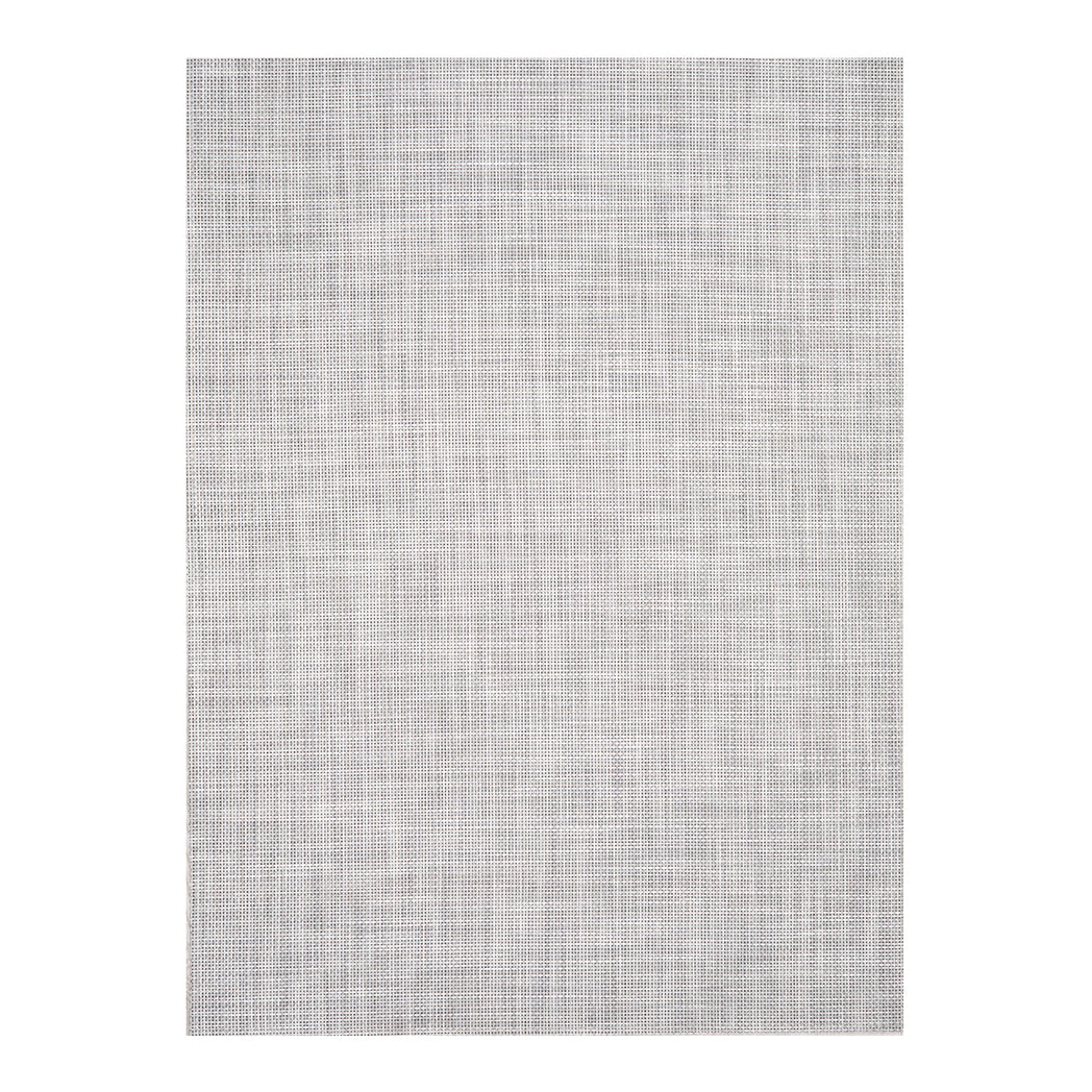 Chilewich Basketweave floor mat in marble, showcasing woven terrastrand yarn texture and modern design aesthetic.