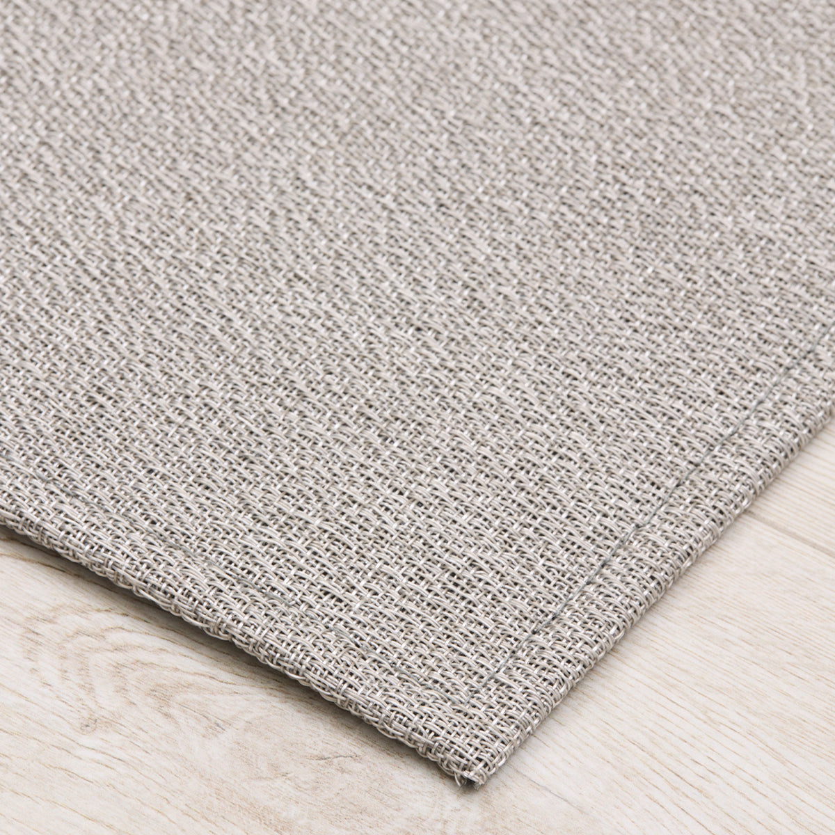 Detail image of Chilewich woven material showcasing texture, color, and pattern of the terrastrand yarn weave.
