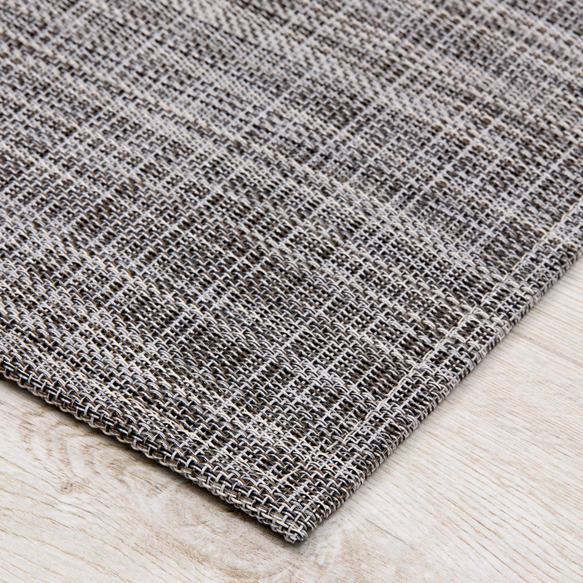 Detail image of Chilewich woven material showcasing texture, color, and pattern of the terrastrand yarn weave.