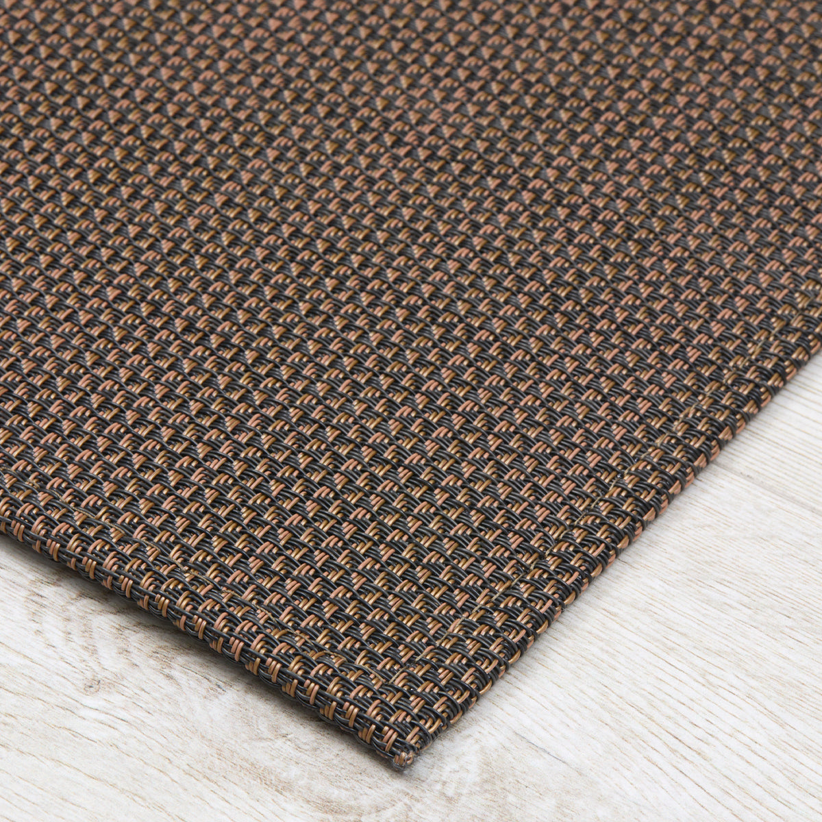 Detail image of Chilewich woven material showcasing texture, color, and pattern of the terrastrand yarn weave.