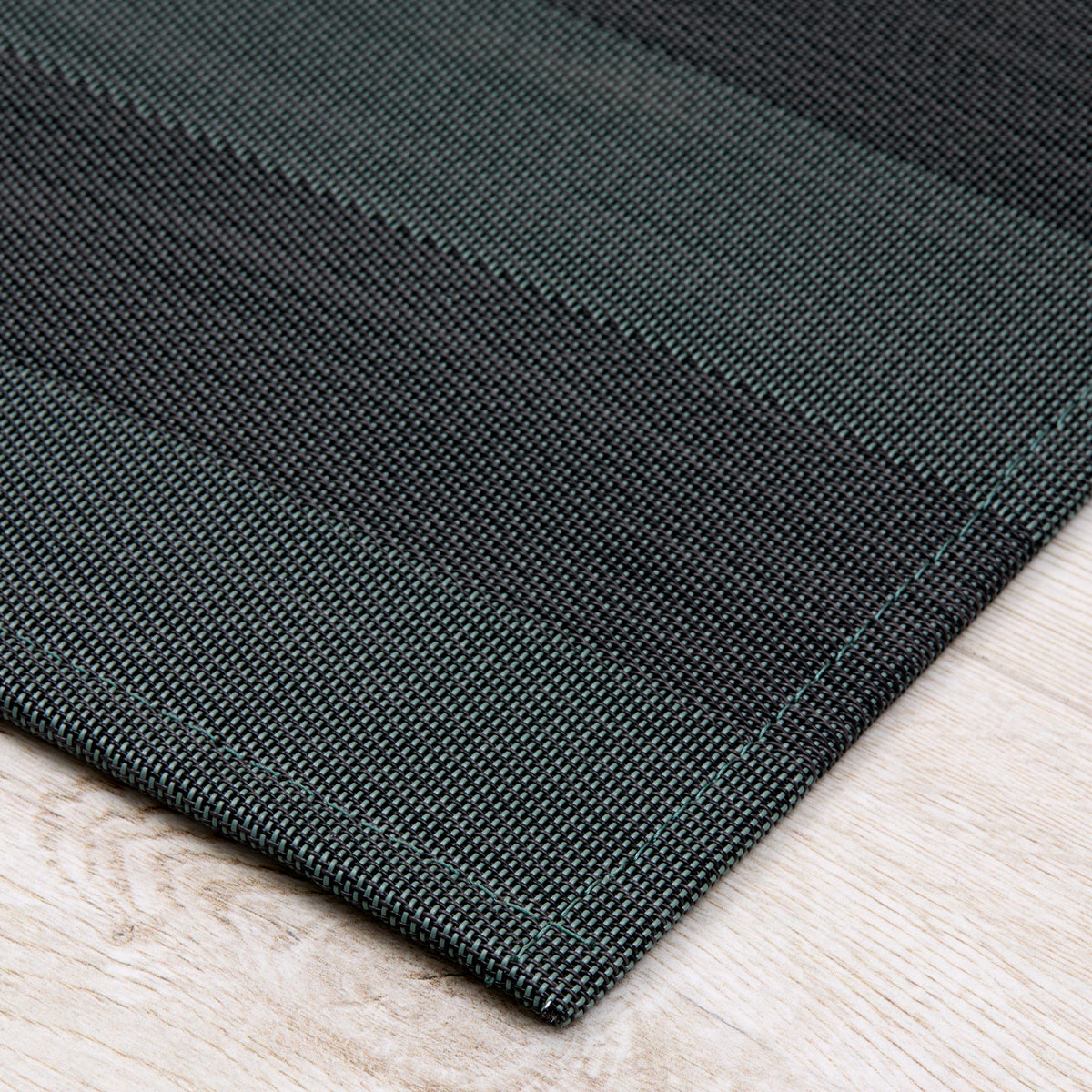 Detail image of Chilewich woven material showcasing texture, color, and pattern of the terrastrand yarn weave.