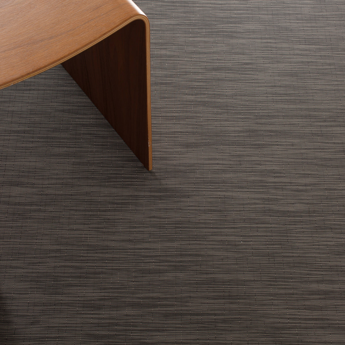 Chilewich woven floor mat in neutral woven terrastrand yarn, durable and stylish for modern living spaces.