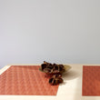 Detail image of Chilewich woven material showcasing texture, color, and pattern of the terrastrand yarn weave.