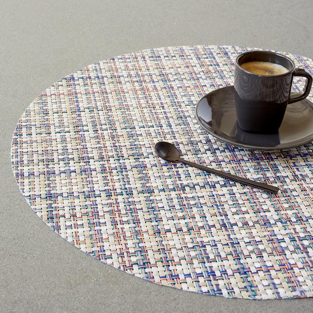 Chilewich Basketweave floor mat in bonbon, showcasing woven terrastrand yarn texture and modern design aesthetic.