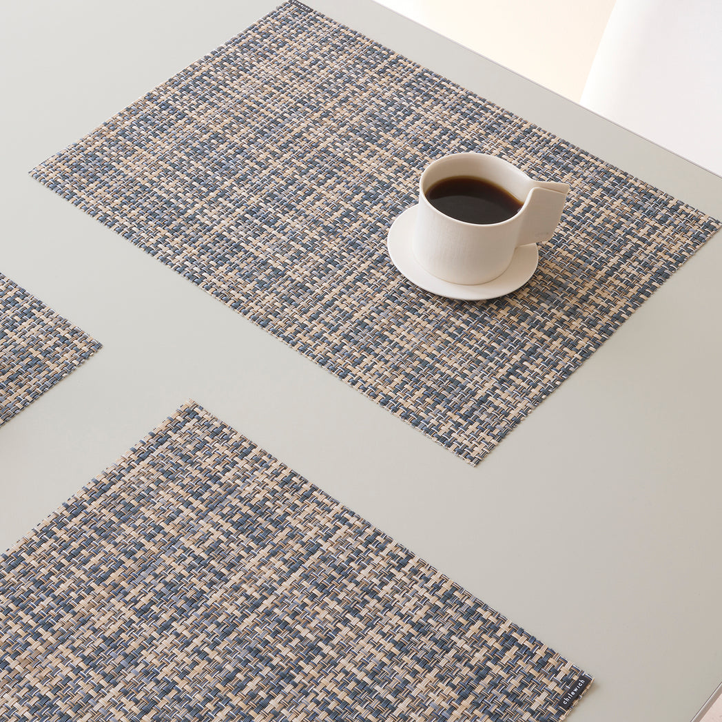 Chilewich Basketweave floor mat in coast, showcasing woven terrastrand yarn texture and modern design aesthetic.