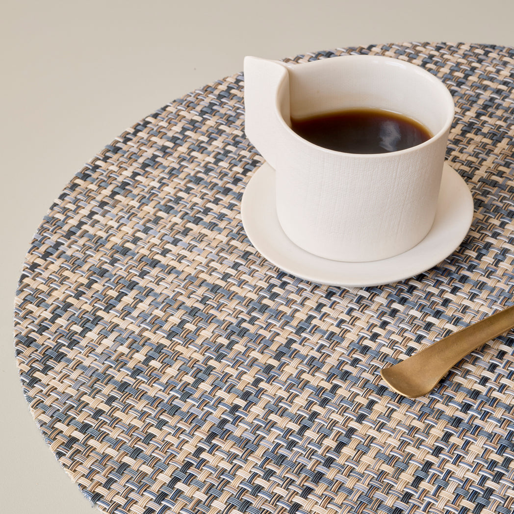 Chilewich Basketweave floor mat in coast, showcasing woven terrastrand yarn texture and modern design aesthetic.
